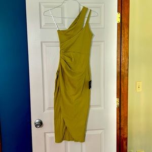 NWT!! Golden one shoulder dress with thigh slit. Size small.